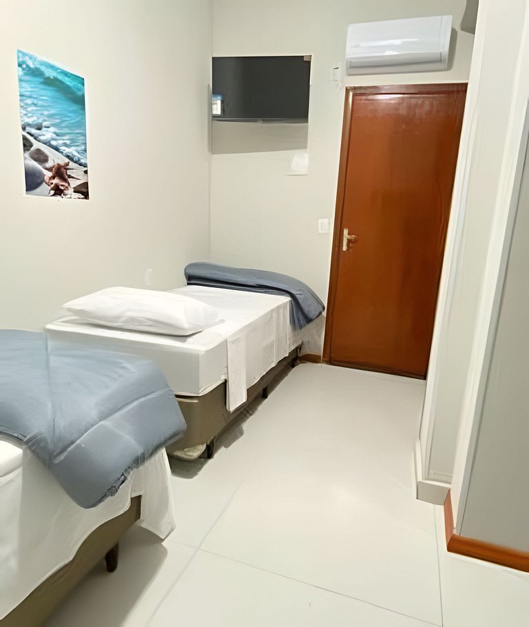 Suíte Tripla com Ar, Frigobar, Tv e Wi-Fi